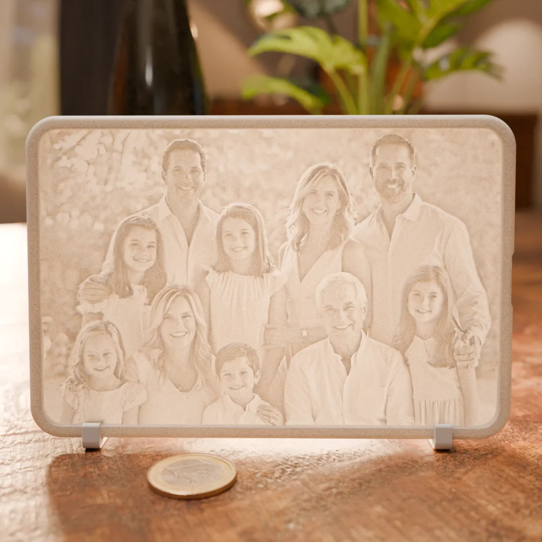 Glimery photo stand - in the light Glimery photo stand with a family photo, backlit to reveal the photo.